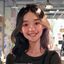 cy社区用户小林同学头像，年轻女生微笑自拍，背景是明亮的插画工作室